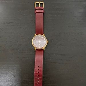 Burgundy (rose gold hardware) Marc by Marc Jacobs watch.